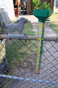 lot 194 image: 4 Iron Gate Dogs (Need Tools to Remove) and Rain Gauge