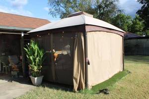 lot 200 image: Garden Canopy Gazebo features zippered screens and Privacy Canvas and Garden String Lights