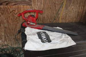 lot 208 image: Toro Ultra Blower Vac with Bag and Extension Cords