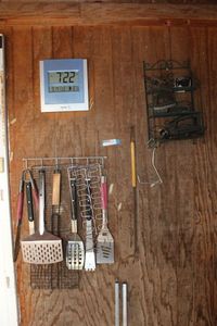 lot 198 image: Grilling UtensilsSpatulas and Grill Cleaning Brushes with Wire Rack and Atomic Clock