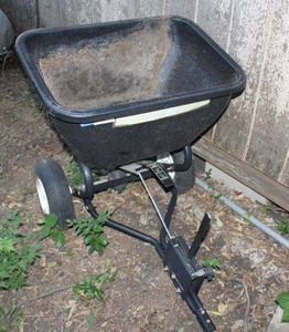 lot 303 image: Brinly Tow Behind Rotary Spreader