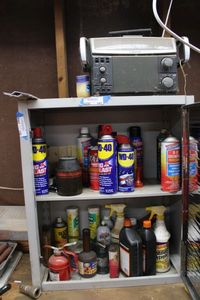 lot 247 image: Contents Only Shop Radio, WD-40, Liquid Wrench and More