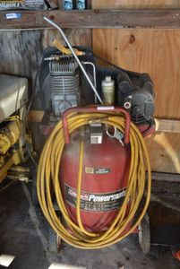lot 218 image: Coleman Powermate Belt Drive Air Compressor