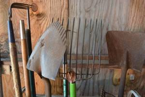 lot 332 image: Metal Rack with Garden Shovels and Forks