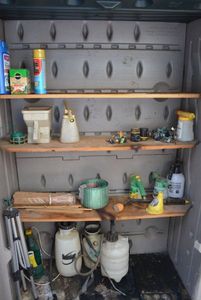lot 354 image: Contents of Cabinet Garden Sprayers, Tripod, Plant Food and More