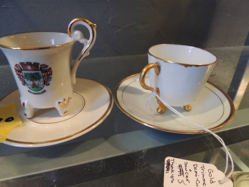 lot 70 image: Braum Holder Cups and saucers 2 dif...