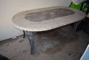 lot 19 image: Outdoor Stone Top Oval Table with Iron Base