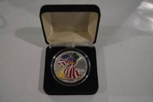 lot 21 image: Colorized Silver American Eagle Coin 2000