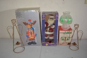 lot 89 image: Rockin Santa Figurine, Fiber Optic Moose Figurine, Wire Angel Candle Holders and Glass Christmas Chandlelle