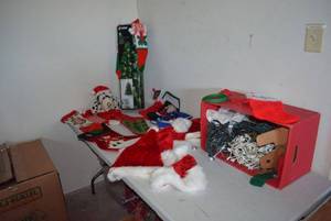 lot 92 image: Christmas Lights, Lighted Wall Tree, Christmas Stockings, and Santa Hats