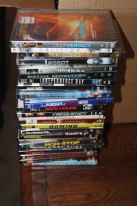 lot 59 image: DVDs Including iRobot, Lord of the Rings 2 Towers, Safe House, and Argo