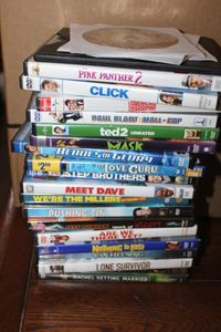 lot 61 image: DVDs Including Mask, Paul Blart Mall Cop, Meet Dave and Lone Survivor