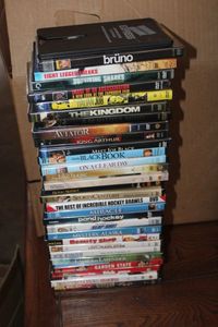 lot 63 image: DVDs Including The Italian Job, The Lake House, Incredible Hockey Brawls, and Miracle