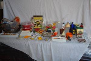 lot 115 image: Misc. Kitchen Lot Hand-held Blender, Cookie Cutters, Potato Pouch Cooker, Garlic Press, Large Mixing Bowl and More