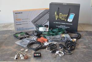 lot 151 image: Sony Wireless Keyboard, Smart  Relief Combo Package, Star Wars Lego Keyrings, Coca-Cola Pin and Wires