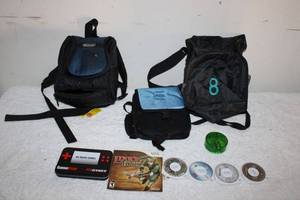 lot 122 image: Gaming Lot Gamer Bags, UMDs, Wii Crossbow Training Disc