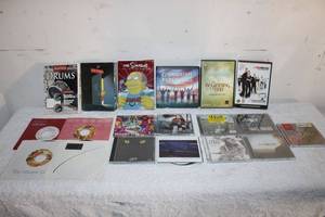 lot 125 image: CDs 5 Unopened (Terri Clark, Trace Adkins, Brad Paisley, Julie Roberts, and Dierks & Bentley), The Simpsons DVD sets Seasons 10 and 12and More