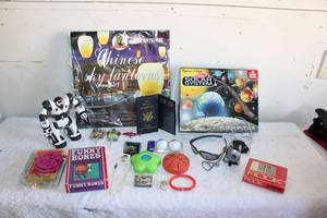 lot 133 image: Kids Lot Solar System Floor Puzzle, Spy Glasses, Ice Packs, Chinese Sky Lanterns, Toys and Souvenirs