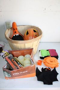 lot 167 image: Halloween Lot Decorative Gourd and Pumpkin, Bushel Basket, Battery operated Candles, Felt and Foam Craft