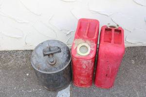 lot 183 image: 2 Metal Jerry Gas Cans and metal Saftey Can