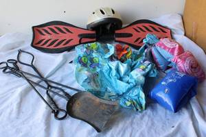 lot 189 image: Inflatable Pool Lounger, Swim Arms, Ripstik Board and Helmet, and Fireplace Tools