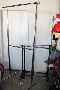 lot 197 image: 3 Rolling Clothes Racks