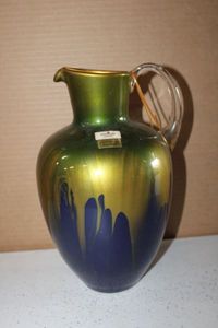 lot 217 image: Handmade Mouth Blown Glass Pitcher tag reads Made in Germany Ambiente Zwiesel looks to be gold flake in glass