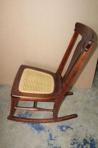 lot 234 image: Antique Cane Seat Rocking Chair from turn of the Century