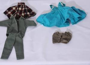 lot 79 image: Lot of what looks like handmade barbie closthes