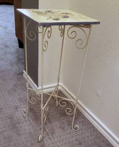 lot 76 image: Plant Stand  - STAGER Inventory  Used for Towels in a model home