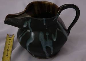 lot 303 image: Handmade Artisan Pitcher