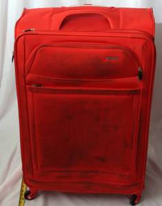lot 328 image: Rolling Suitcase  Orange 31 tall  American Tourister