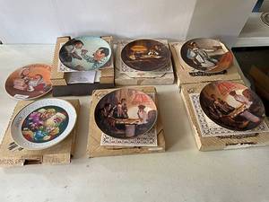 lot 53 image: Vintage Plates This is the Room that light made, The Painter, Fathers Help, Open Wide, Christmas 1985 Morman Rockwells Grandpa Plays Santa