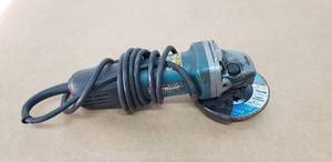 lot 11 image: Makita 9557NB  4.5 Angle Grinder