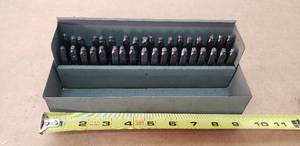 lot 52 image: Complete Set of Punches with Metal Case