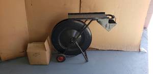 lot 112 image: Banding Machine with Large Box of Staples, GSI Strapping Tensioner, and Strapping Sealer