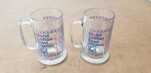 lot 191 image: Pair of Mobil Cotton Bowl Classic Mugs - 1937-1994