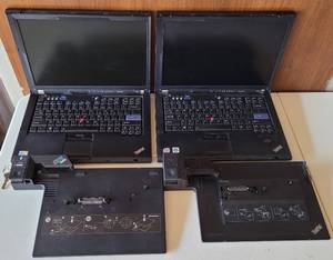 lot 33 image: LOT OF LENOVO LAPTOP COMPUTERS AND DOCKING STATIONS AS SHOWN. NO POWER CORDS. CONDITION UNKNOWN.