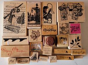 lot 44 image: LOT OF 24 RUBBER STAMPS IN VARIOUS SIZES AND DESIGNS AS SHOWN.