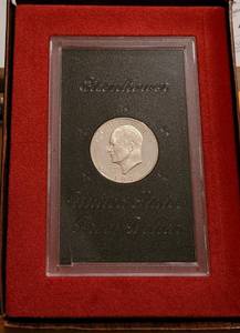 lot 65 image: 1971 EISENHOWER BROWN PACK DOLLAR PROOF COIN AS SHOWN.