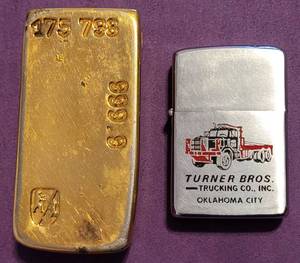 lot 84 image: LOT OF 2 VINTAGE LIGHTERS INCLUDING (1) BERENDSOHN GOLD BAR 175 798 999.9 MADE IN GERMANY AND (1) ZIPPO AS SHOWN. (SOLD 2X THE MONEY)