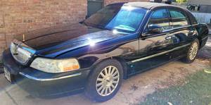 lot 3 image: 2003 LINCOLN TOWNCAR SIGNATURE SERIES VIN# ILNHM82W23Y640980. RUNS AND DRIVES. CLEAR TITLE IN HAND. SEE FULL DESCRIPTION FOR MORE DETAILS LOCATIONPREVIEWPICK-UP IS DIFFERENT FOR THIS LOT