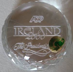 lot 105 image: WATERFORD CRYSTAL DOME PAPERWEIGHT WITH ORIG. LABEL. REVERSE INSCRIBED ADP IRELAND 2000 AND THE PRESIDENTS CLUB IN SCRIPT. ABOUT 4W AS SHOWN.