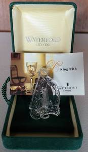 lot 118 image: WATERFORD CRYSTAL HARP PINBROOCH IN LOGO VELVETEEN STORAGE POUCH IN BOX. ETCHED WATERFORD MARK WITH BOOKLET 2H AS SHOWN.