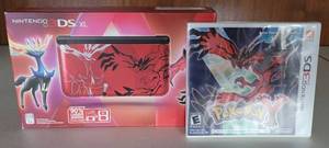 lot 137 image: COLLECTORS ALERT NEW AND UNOPENED NINTENDO 3DS XL POKEMON X AND Y XERNEAS YVELTAL RED EDITION HANDHELD SYSTEM PLUS NEW, UNOPENED POKEMON Y GAME AS SHOWN. AMAZING FIND SEARCH IT UP
