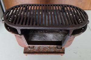 lot 151 image: CAST IRON HIBACHI-STYLE GRILL AS SHOWN.
