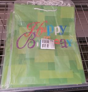 lot 179 image: LOT OF 4 PACKS OF LARGE AMERICAN GREETINGS BIRTHDAY GIFT BAGS AS SHOWN. EACH PACK CONTAINS 6 BAGS. (SOLD 4X THE MONEY)