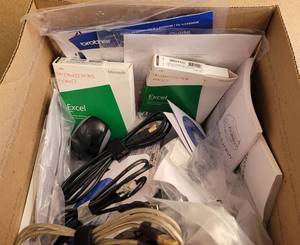 lot 216 image: BOX LOT OF VARIOUS COMPUTER SOFTWARE, MANUALS, CORDS AND MORE AS SHOWN.
