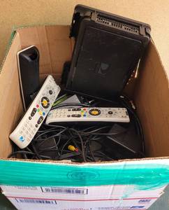 lot 217 image: BOX LOT OF DIRECT TV BOXES, REMOTES AND MORE AS SHOWN.