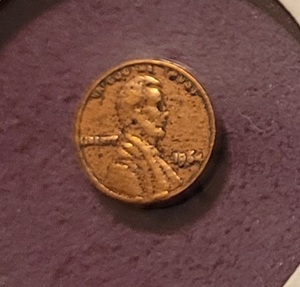 lot 93 image: 1964 MINIATURE LINCOLN PENNY COIN PROTECTOR AS SHOWN. TAKE A LOOK